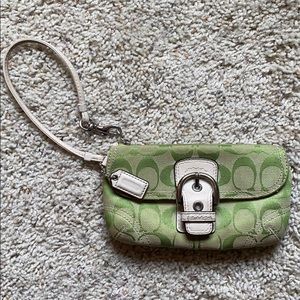 Coach green and cream clasp wristlet